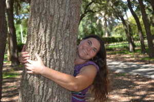 Niki hugging a tree - Healing community in St. Petersburg